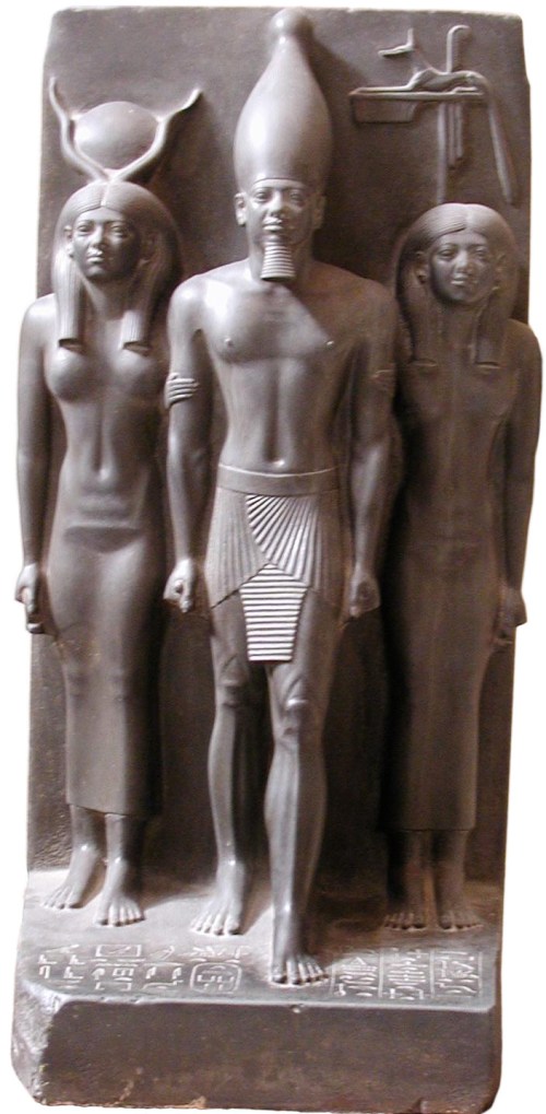 Pharaoh Menkaura with Hathor and Anput (ca. 2500 BCE). Pharaoh Menkaura with Hathor and Anput (ca. 2500 BCE)